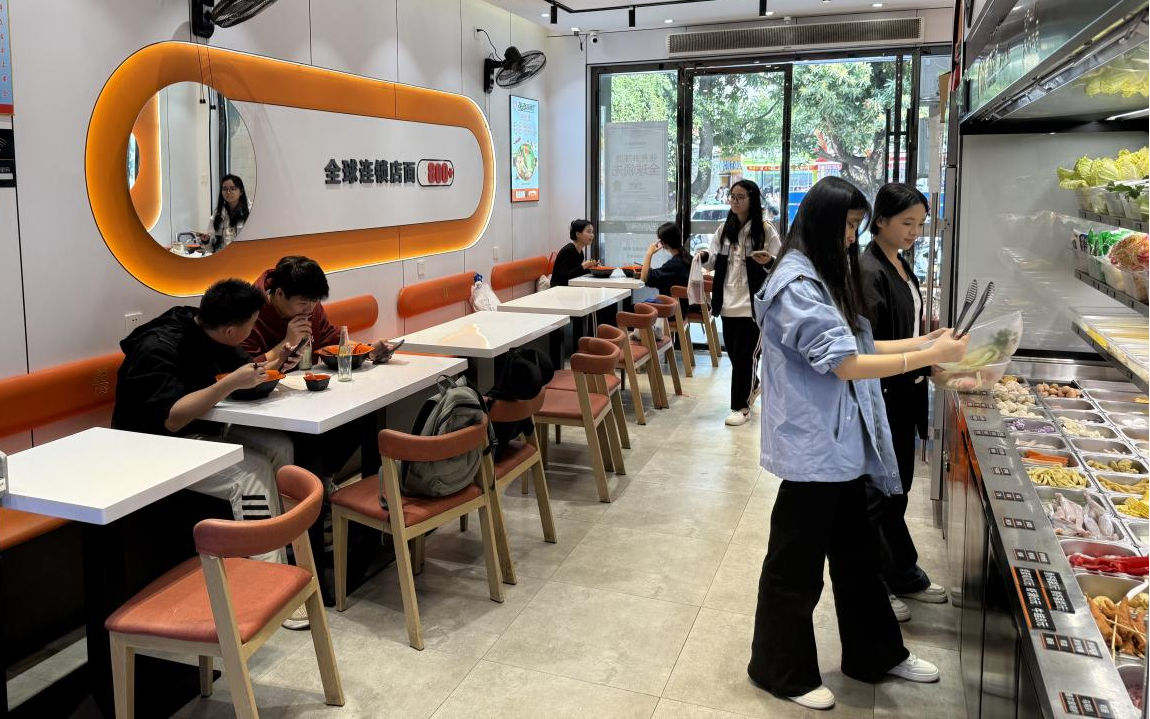 灵山90后创业者李春阳：从3年直营店员到2家门店老板，被一碗麻辣烫改变的人生